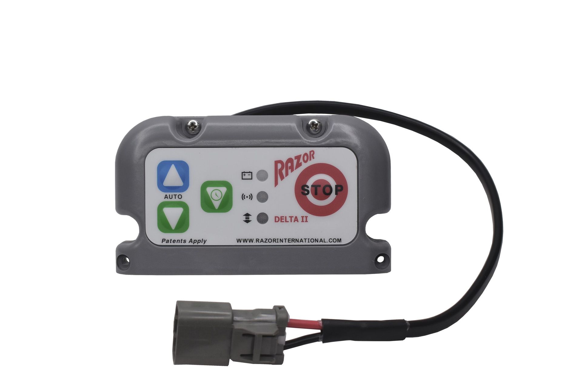 Gray control box with buttons and a cable connected to a black plug connector