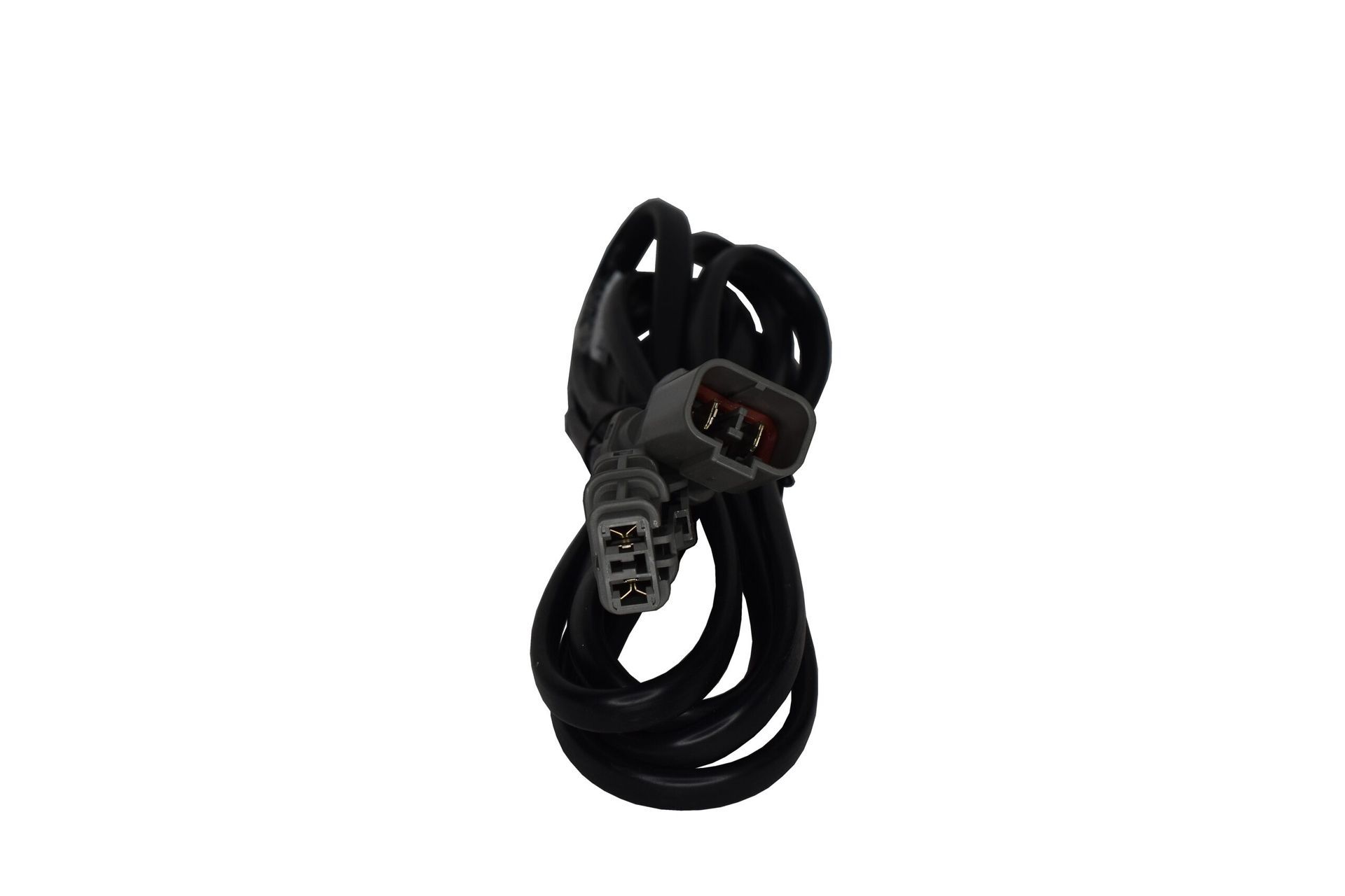 Black coiled electrical cable with connectors on a white background