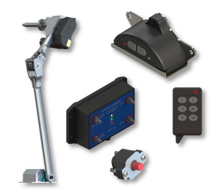 Assorted black and gray electronic switch and control components, including a remote and push button.