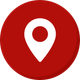 A red circle with a white pin in the middle.