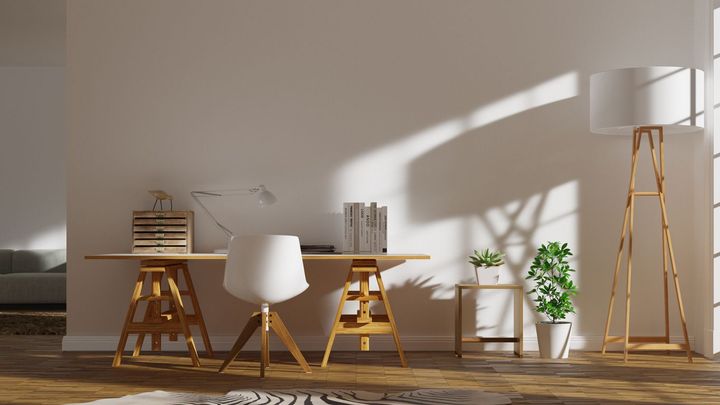 There is a desk and chair in the room.