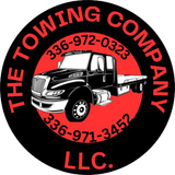 The logo for the Towing Company LLC shows a black truck