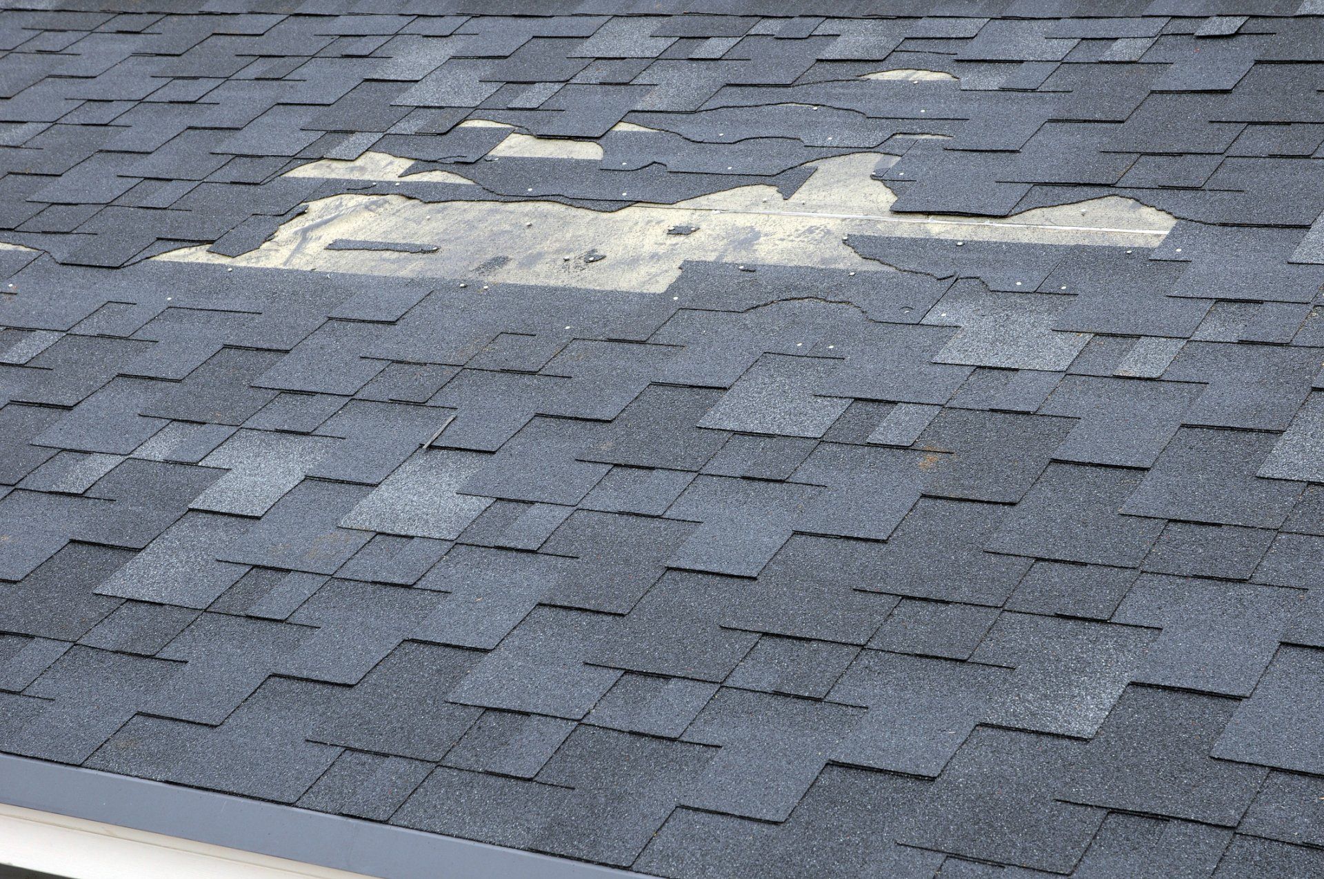 A close up of a roof with a hole in it.