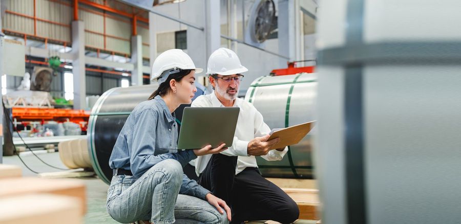 Staffing coordinator reviewing workforce plans in a modern workplace