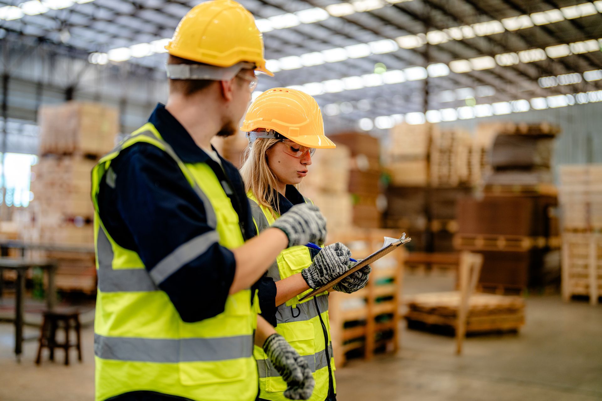 Staffing coordinator reviewing workforce plans in a modern workplace