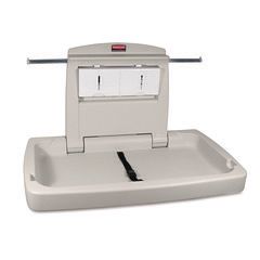 A diaper changing table is sitting on top of a white surface.
