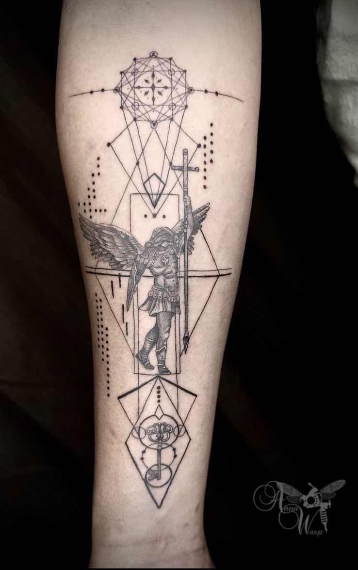 Tattoo of an angel with a sword, geometric shapes, and lines on a forearm.