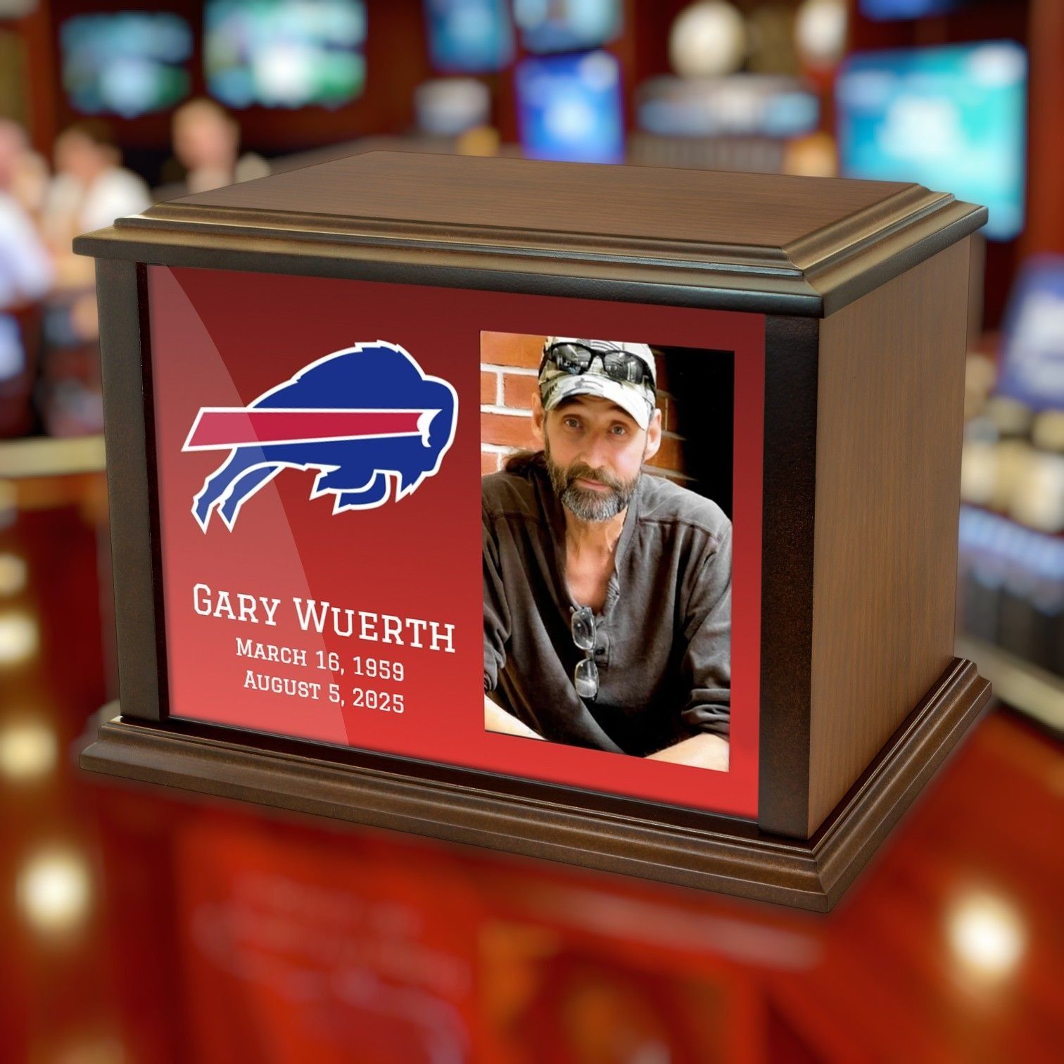 Memorial plaque with Buffalo Bills logo, a man’s portrait, and text for Gary Wuerth on a wooden display