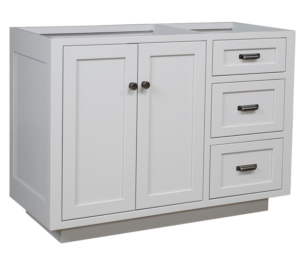White bathroom vanity cabinet with two doors and three drawers, set on a gray base.