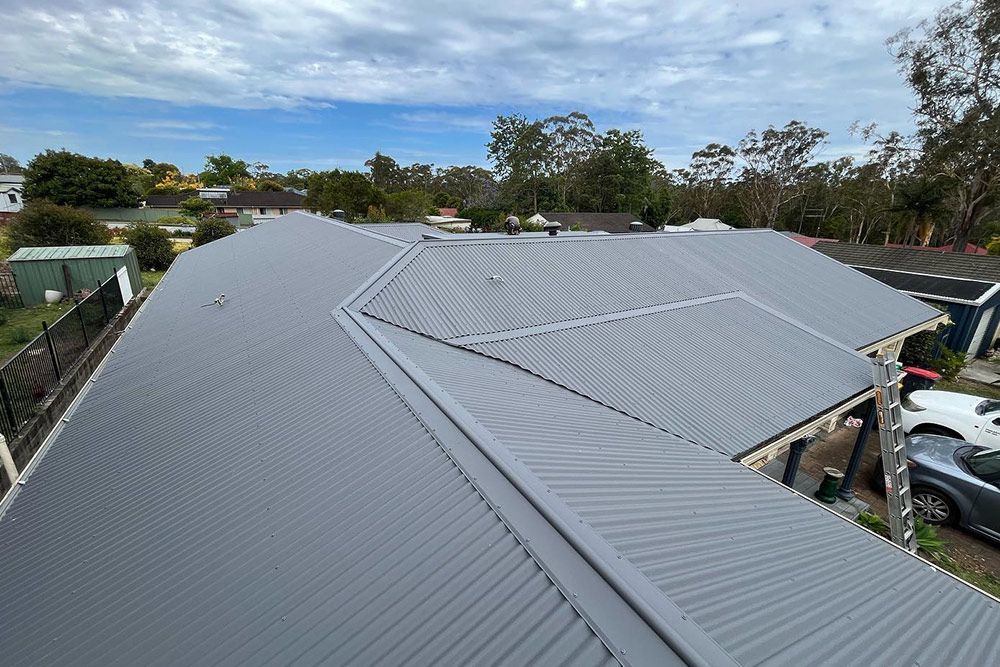 Long, Slate-Grey Roofing — Roofer in Newcastle, NSW