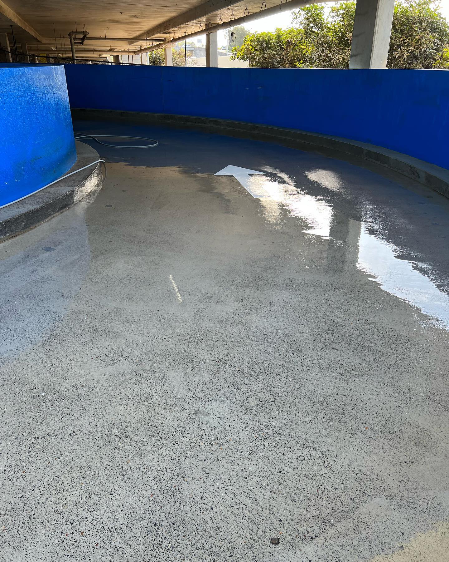 an image of a clean driveway after a great job by our pressure cleaning business