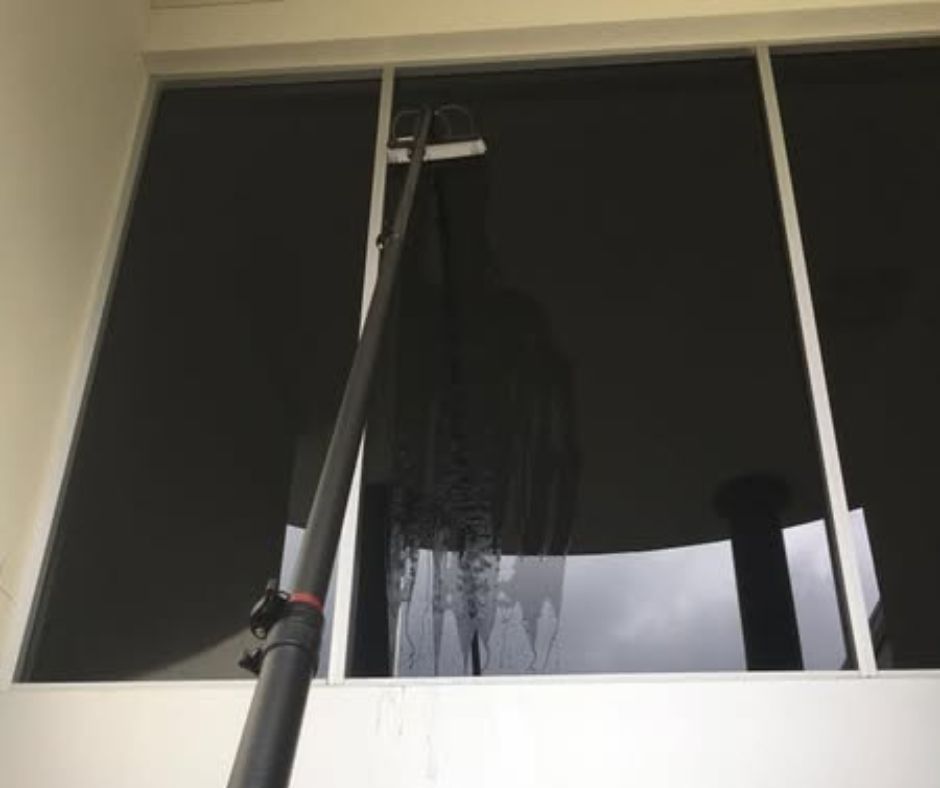 Professional window washing service by Get Wet Cleaning Services team