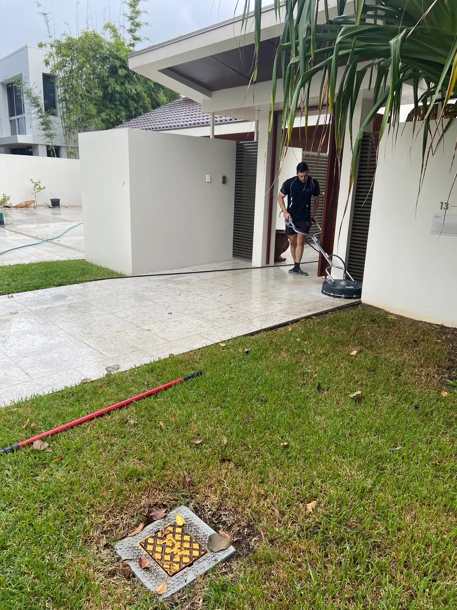 action shot of a real estate pressure cleaning