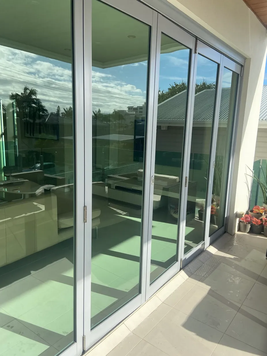 an image of a clean set of glass doors after a real estate window cleaning service by Get Wet