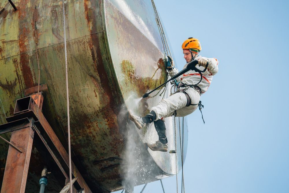 Person in Safety Gear Power Washing — Sirocco Industrial in Pinelands, NT