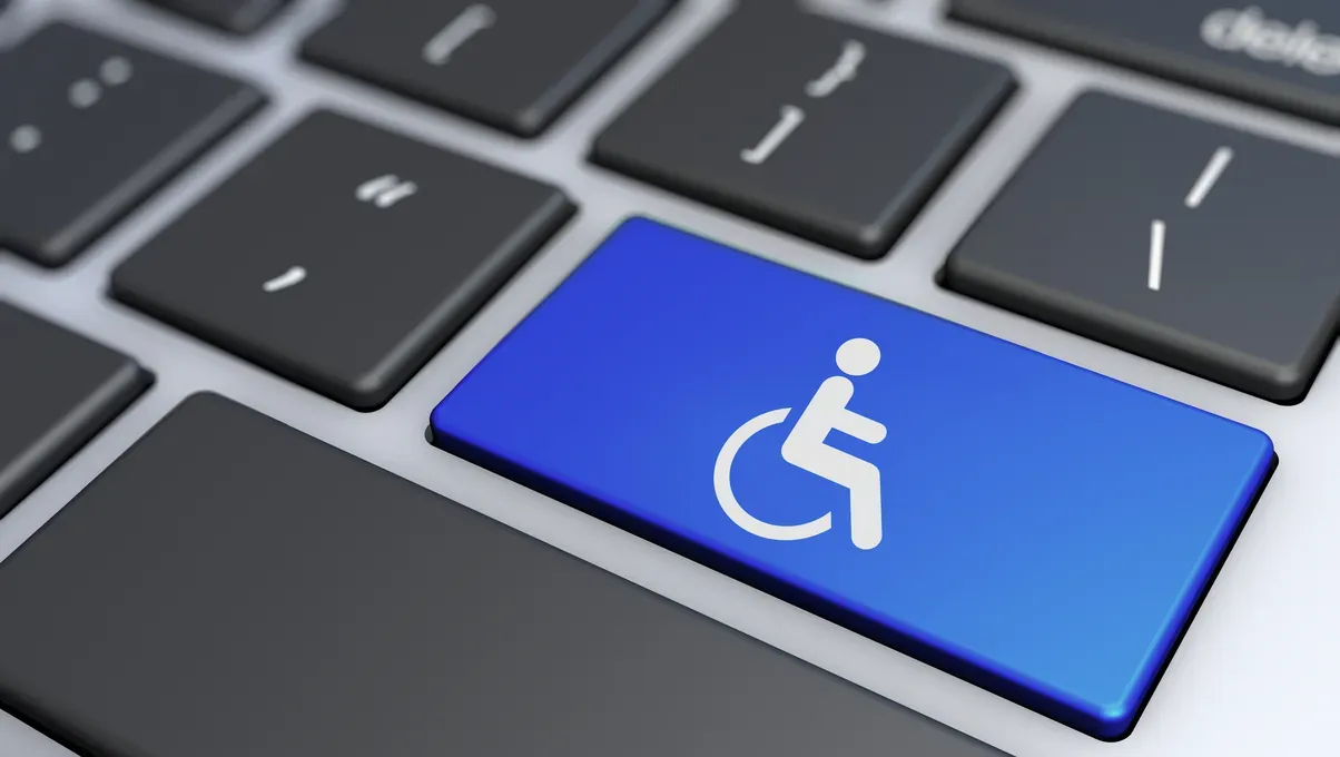 Blue keyboard key with white accessibility icon.