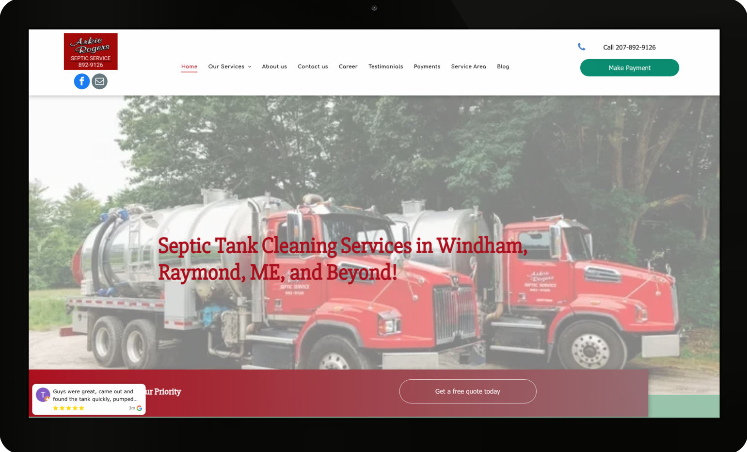 A computer screen shows a website for a plumbing company.