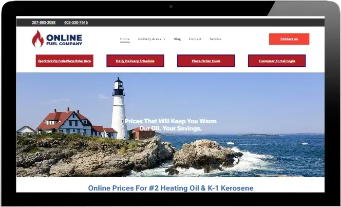 Heating oil company website with lighthouse photo and red navigation buttons on a laptop screen