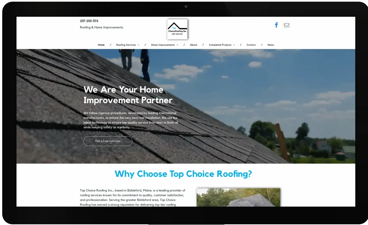 A computer screen shows a website for top choice roofing.
