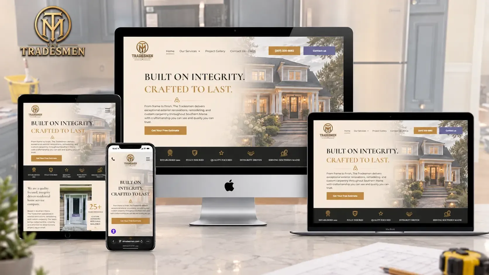 Website mockup displayed on desktop, laptop, tablet, and phone in a bright office setting