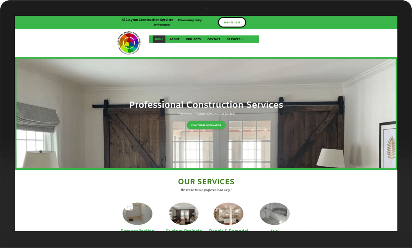 A computer screen shows a website for a construction company.