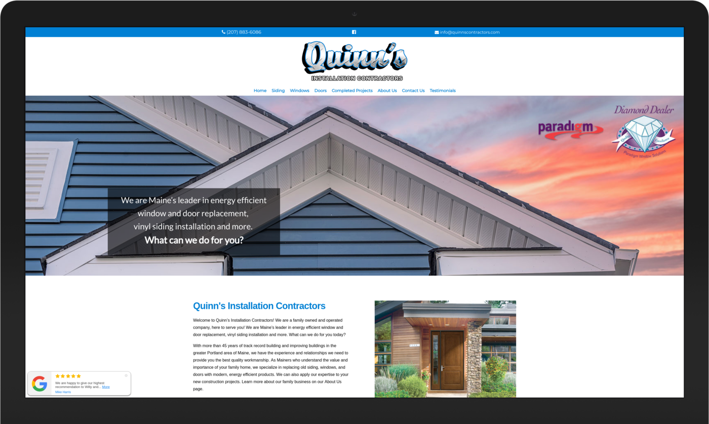 A computer screen shows a website for a roofing company.