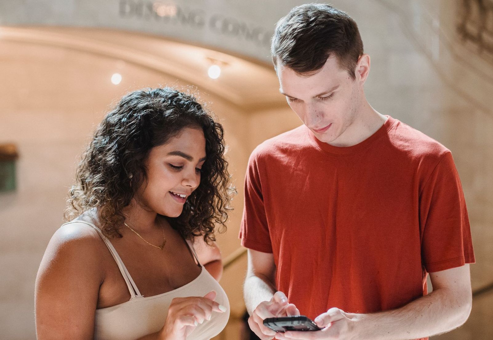 Two people scrolling on social media