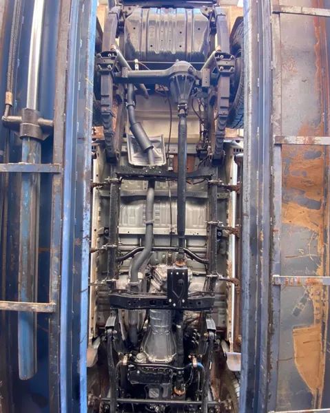 Underside of a Vehicle Chassis in a Repair Bay — Traction Diesel Services in Clermont, QLD