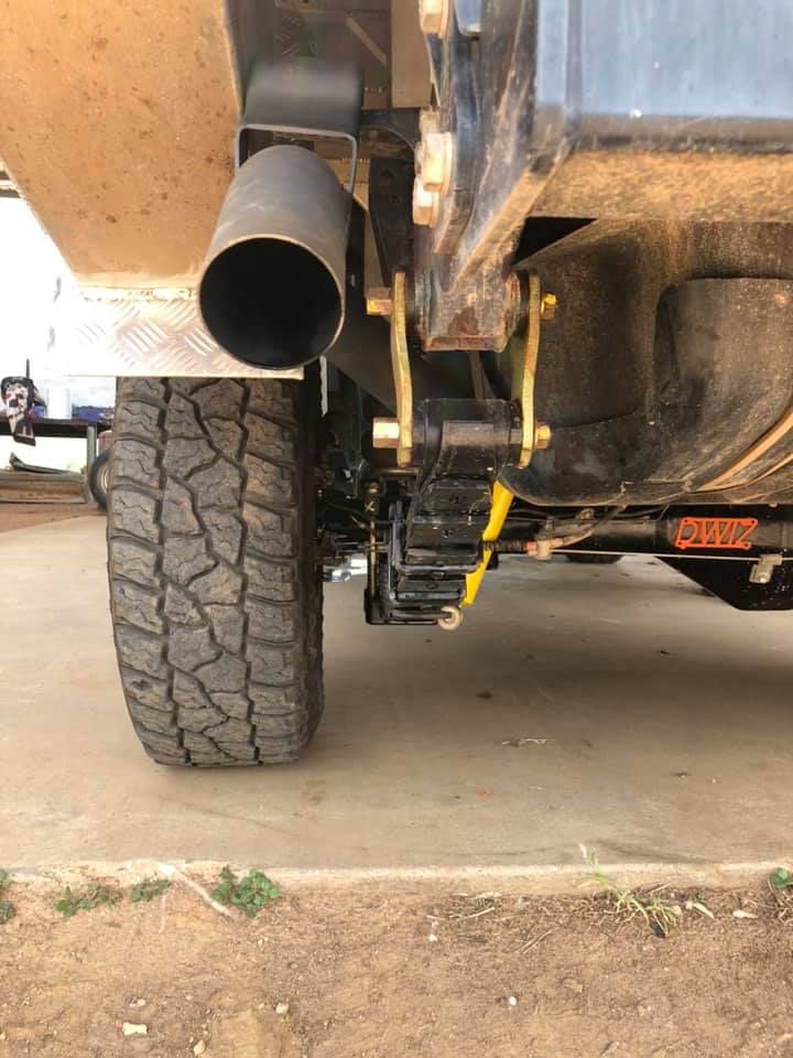 Undercarriage of a Vehicle With a Tire — Traction Diesel Services in Clermont, QLD