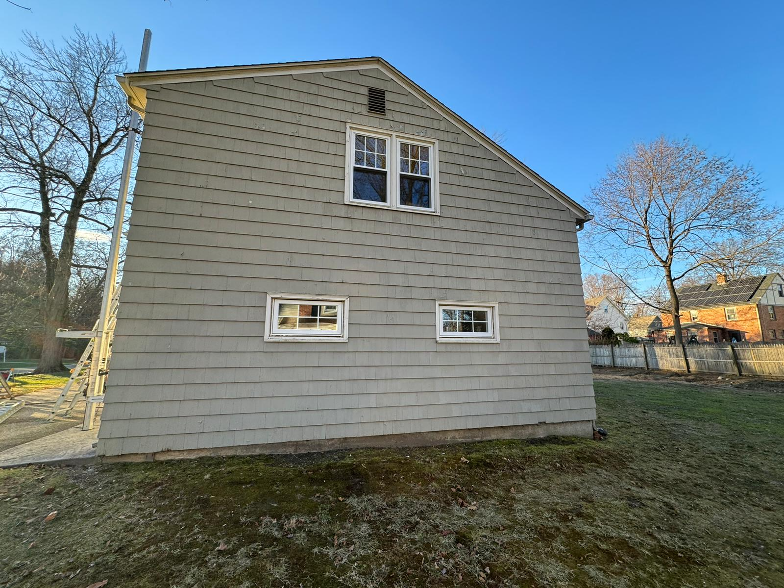 beige siding installation completed in Maine