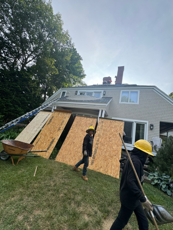 Roofing services being performed in maine