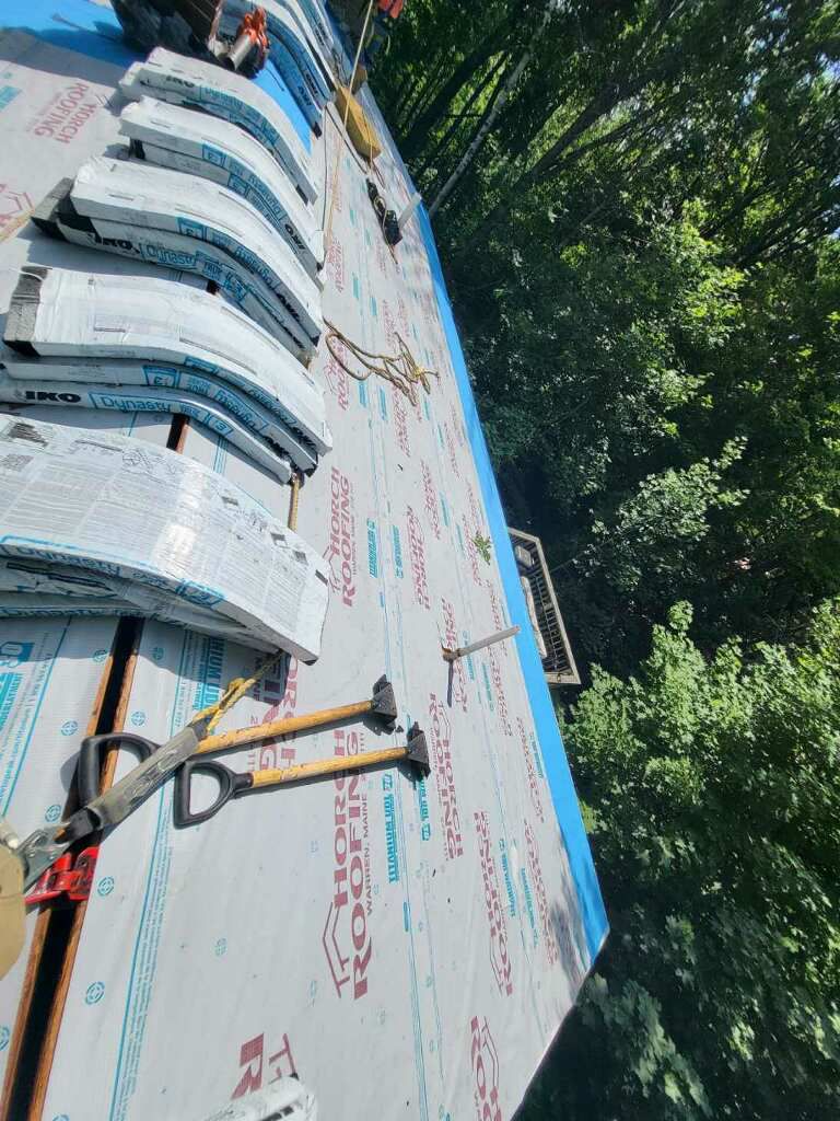 high shot of asphalt shingle roof replacement in maine