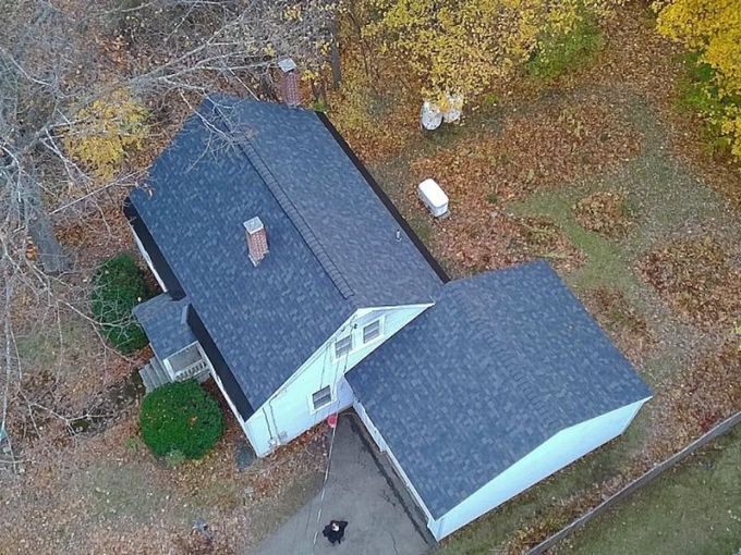 aerial view of asphalt shingle roof mjj roofing and siding