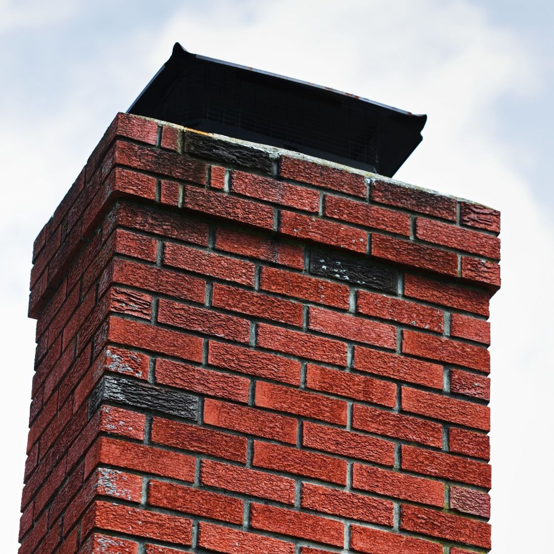 shot of a chimney cap over chimney