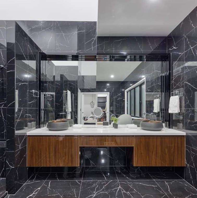 A Bathroom With Two Sinks and a Large Mirror — Truline Cabinets In Cooroy, QLD