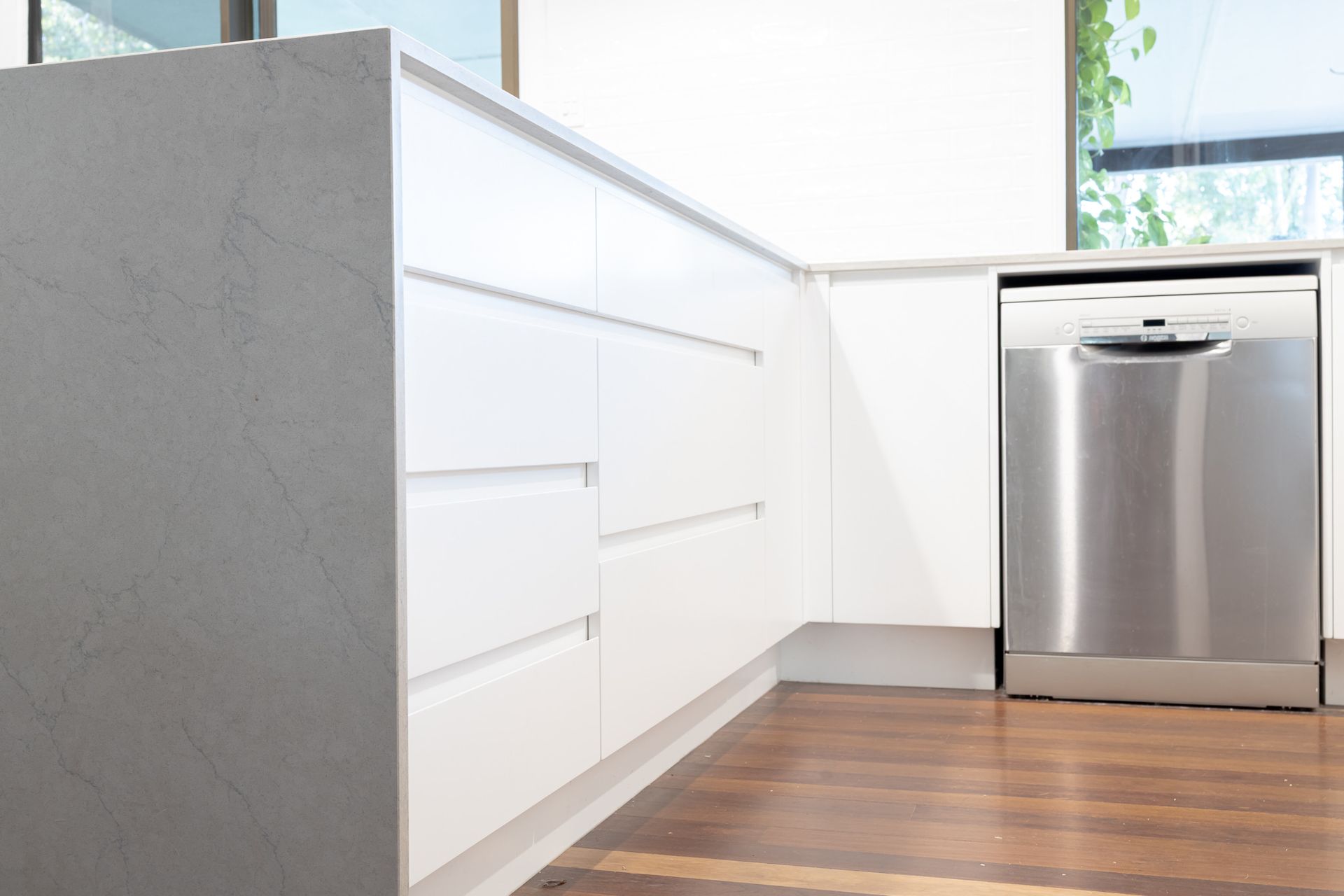 Large Drop Light Over A White Kitchen — Truline Cabinets In Tuchekoi, QLD