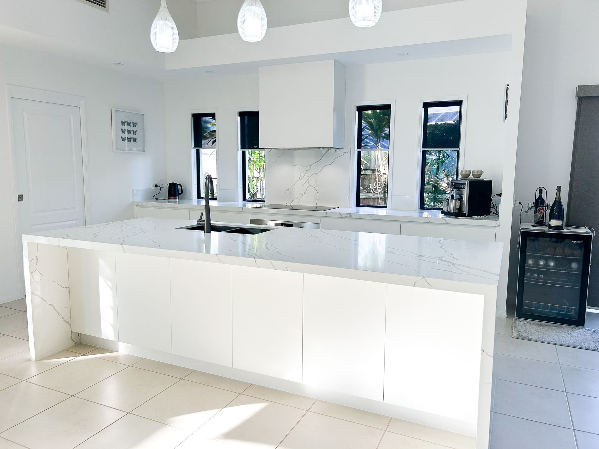 Sleek White Kitchen Cabinets — Truline Cabinets In Tuchekoi, QLD