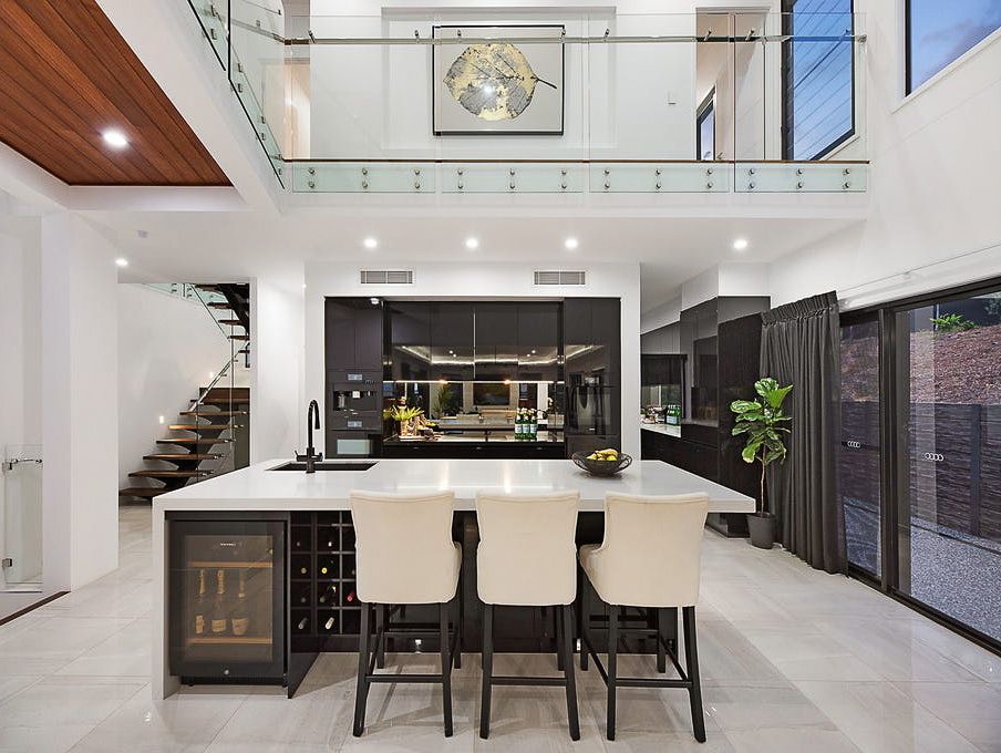 Three Beige Chairs Up Against A Kitchen Island — Truline Cabinets In Tuchekoi, QLD