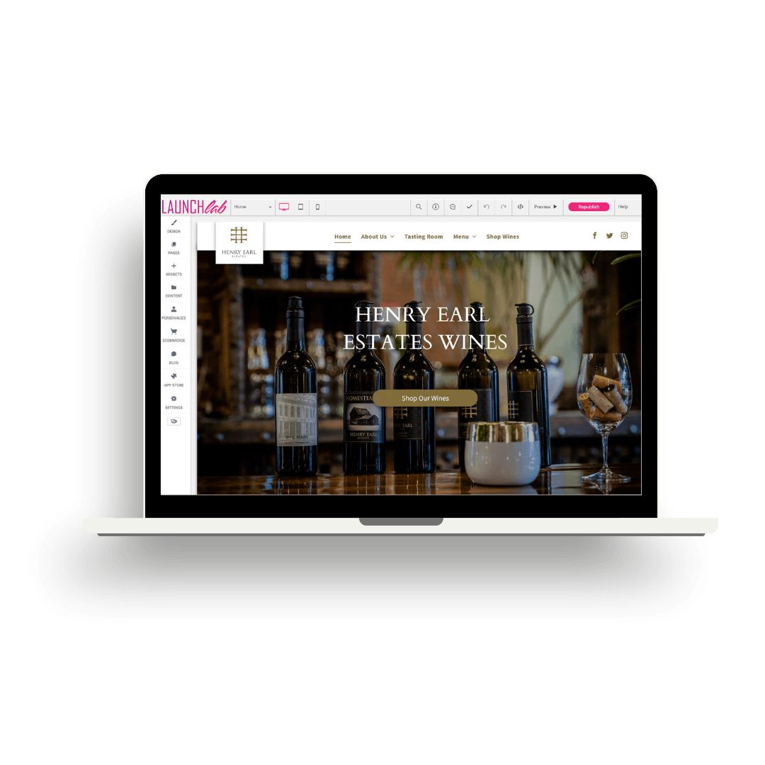 A laptop computer is open to a website for henry bar estate wines.