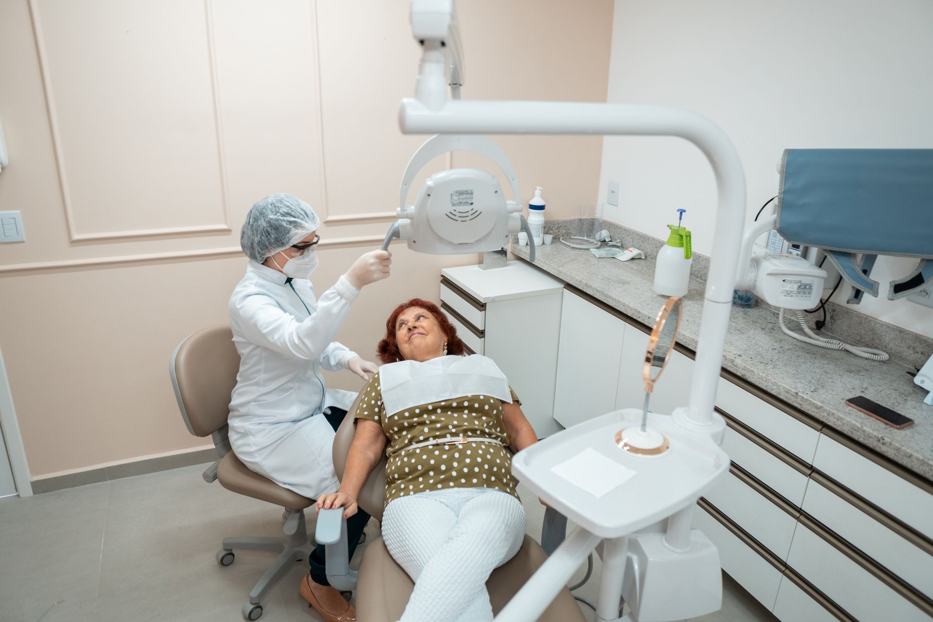 Patient undergoing a dental examination, focusing on comprehensive general dentistry services. Patient undergoing a dental examination, focusing on comprehensive general dentistry services.