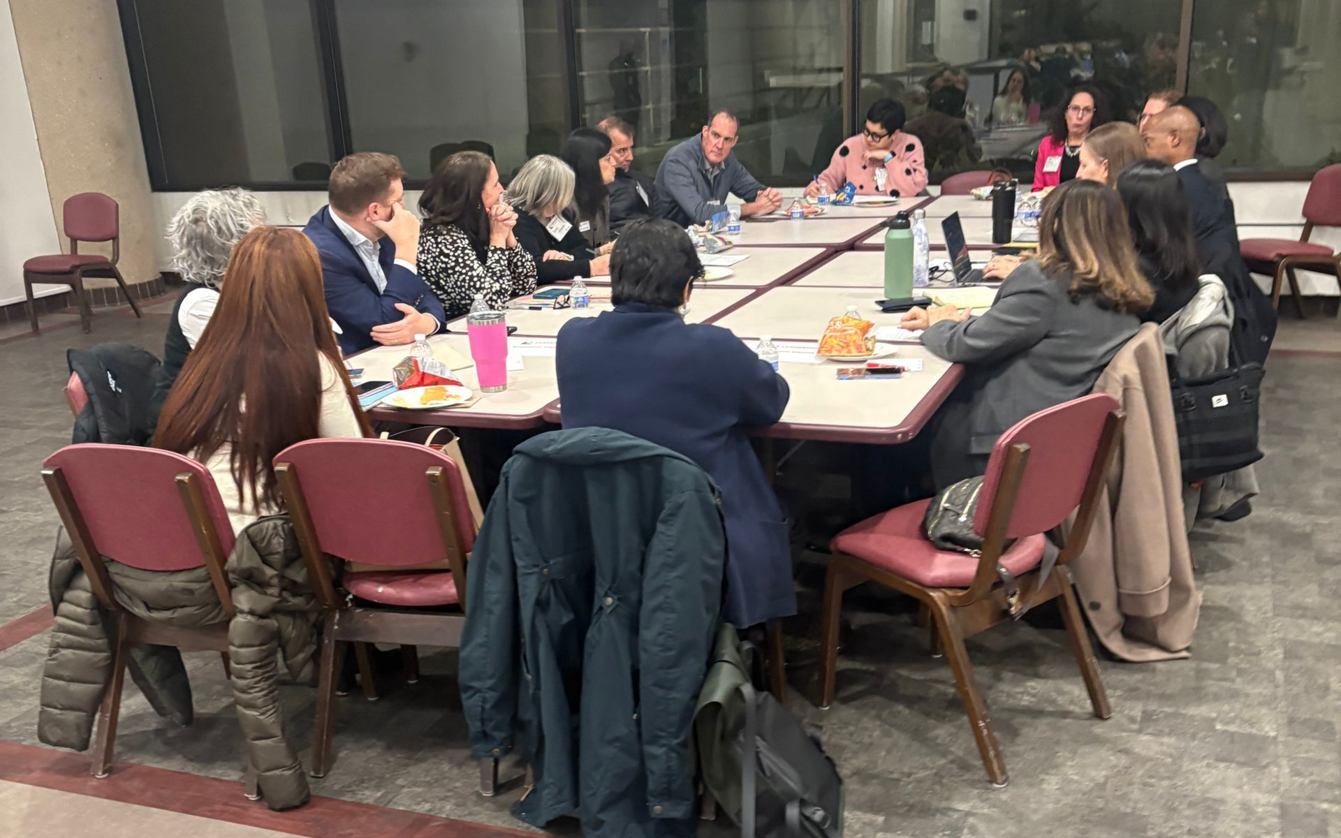 Group of leaders sitting around a table