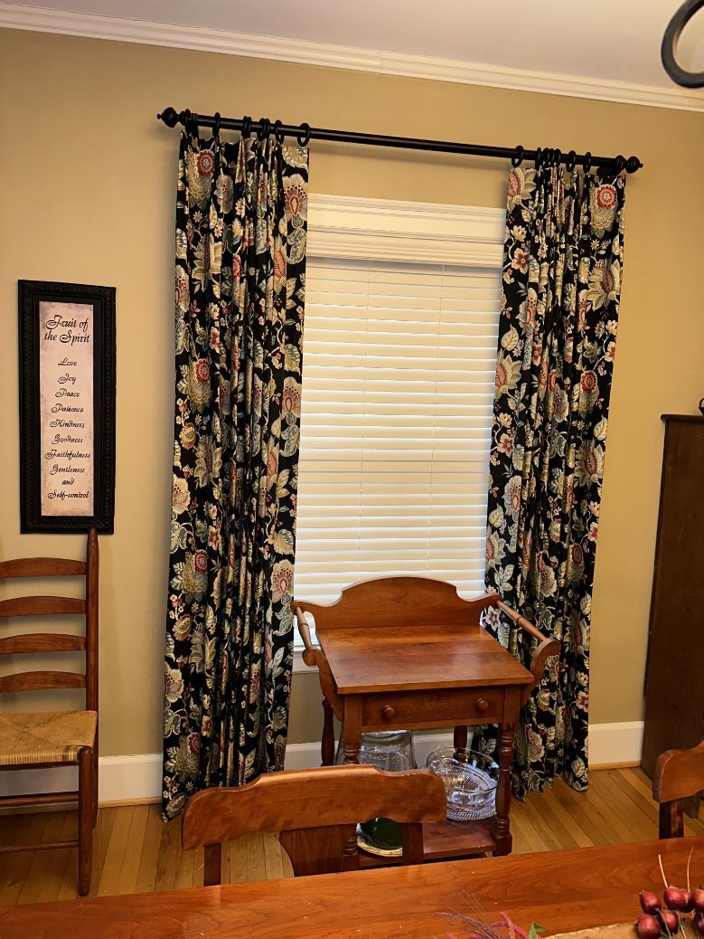 Faux wood blinds on a window with dark, patterned drapes - window fashions on wheels, kentucky