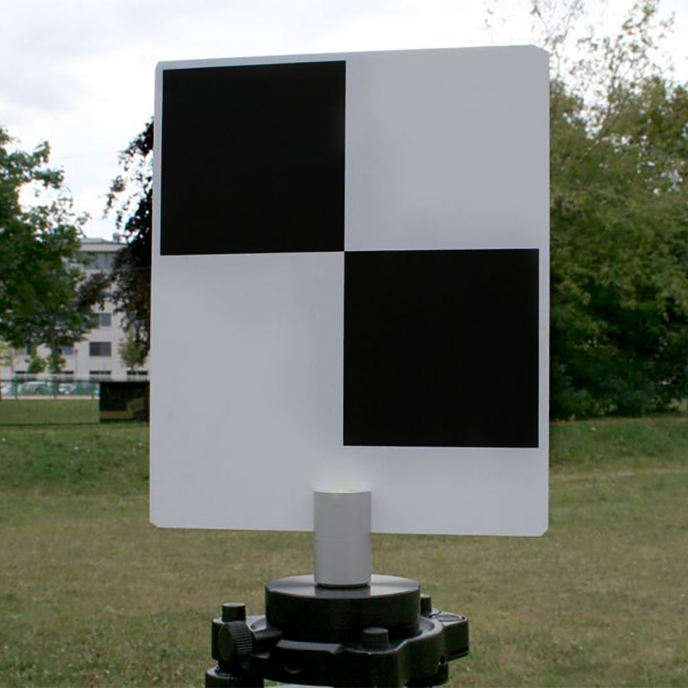 A black and white checkered board with measurements on it.