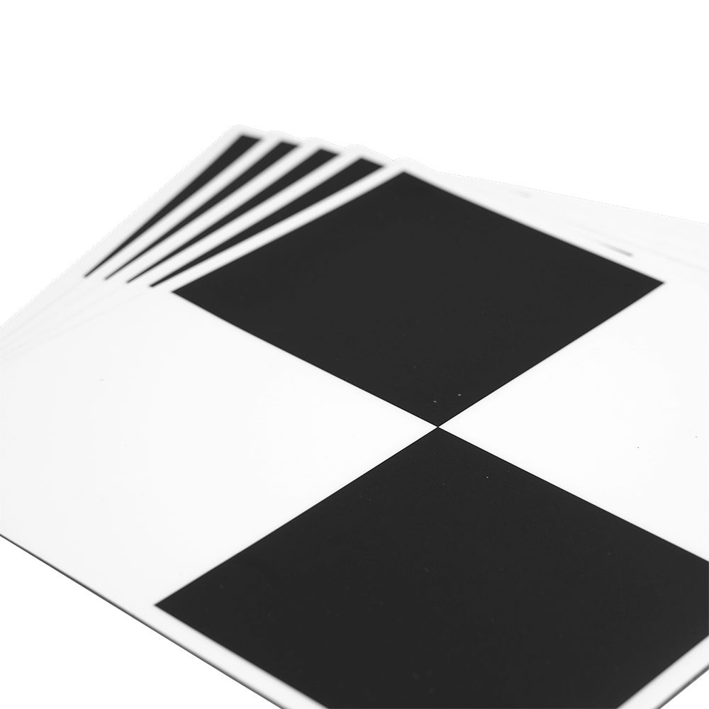A black and white checkered pattern on a piece of paper