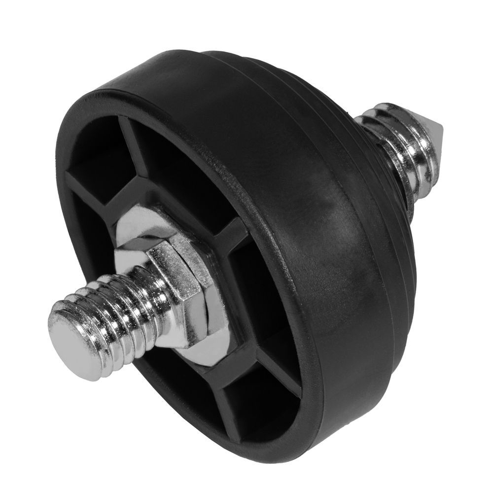 A close up of a metal nut and washer on a black object