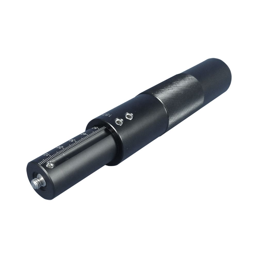 A close up of a black object on a white background.