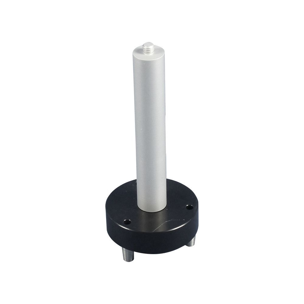 A metal cylinder with a black base on a white background.