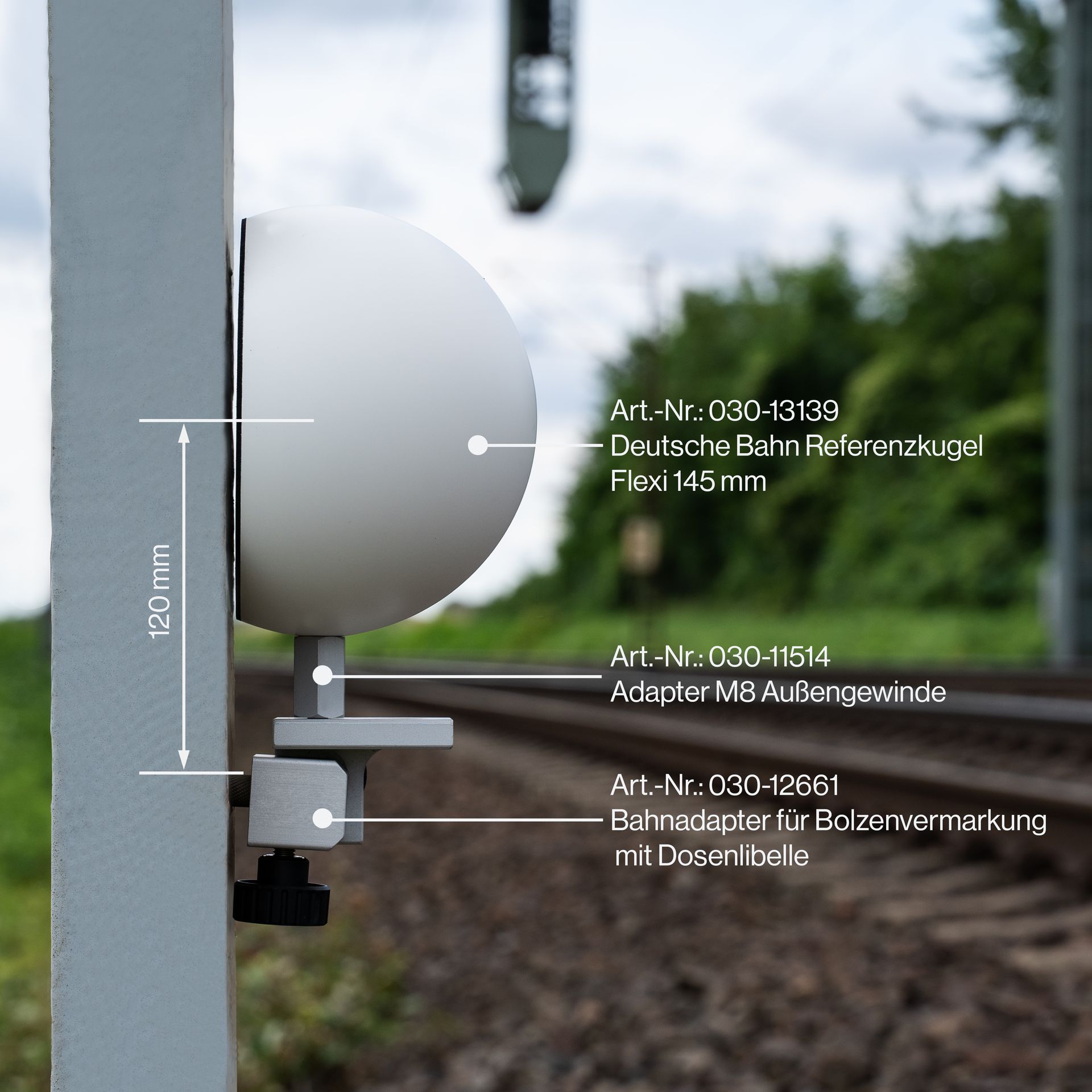 A white object is attached to a pole with measurements on it