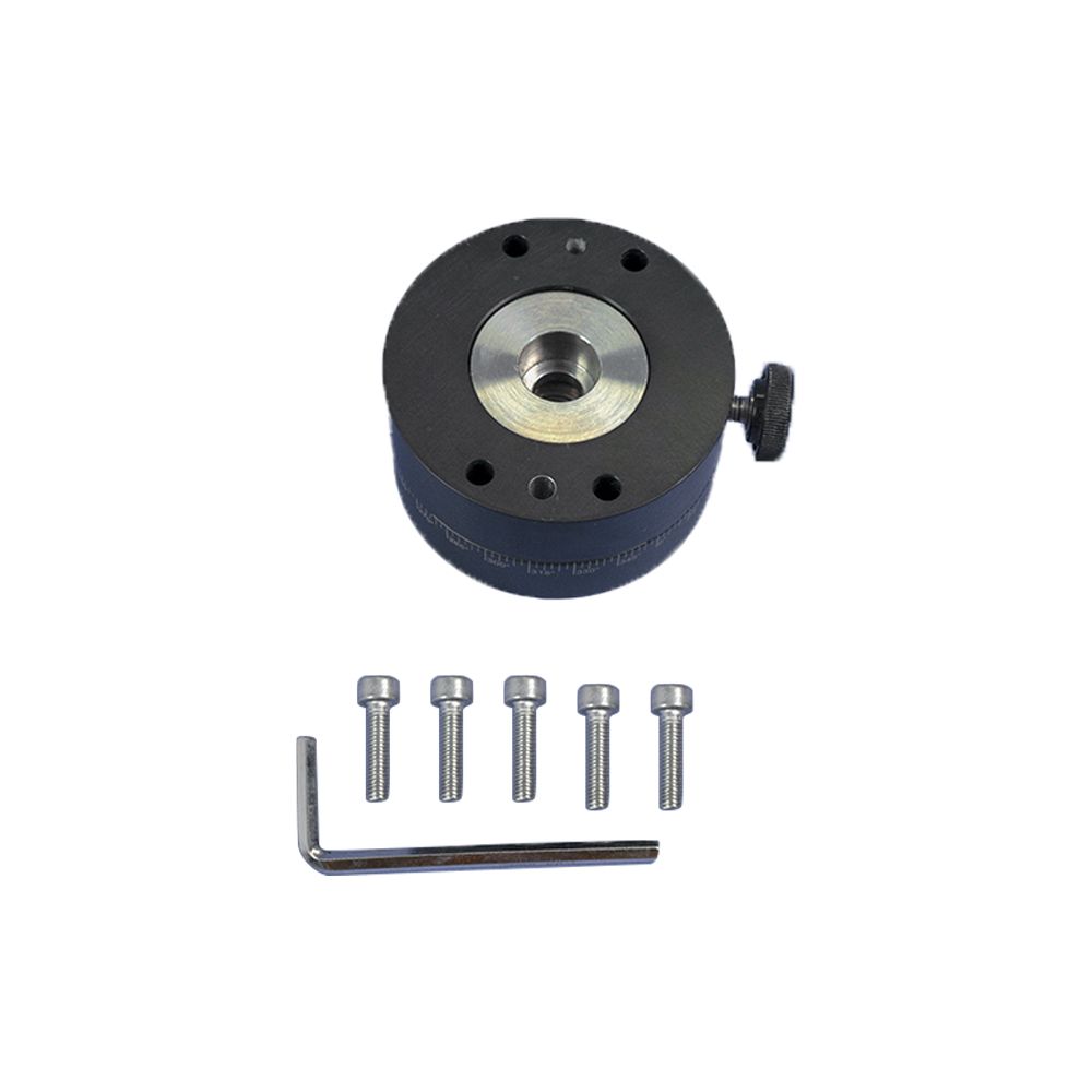 A black object with screws and a wrench on a white background.