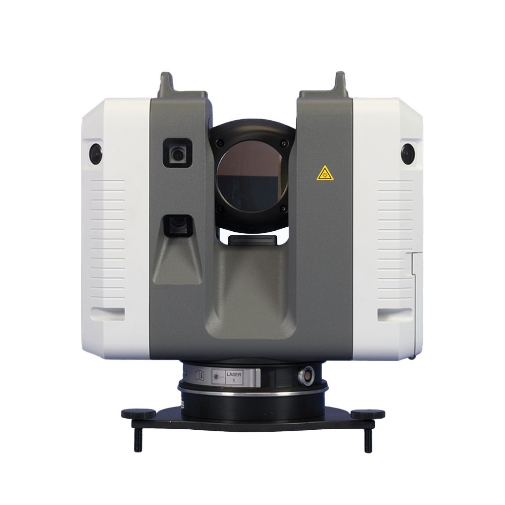 A leica camera is sitting on a white surface